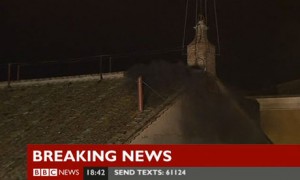 Black smoke from the Sistine Chapel chimney indicates no pope has been chosen today on 12 March 2013